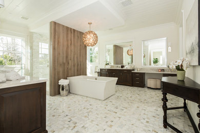 Bathroom - large traditional master marble tile marble floor and multicolored floor bathroom idea in Los Angeles with raised-panel cabinets, brown cabinets, a hinged shower door, quartzite countertops, white walls and an undermount sink