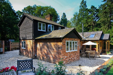 Inspiration for a rural house exterior in Surrey.