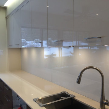 White Glass Kitchen Backsplash