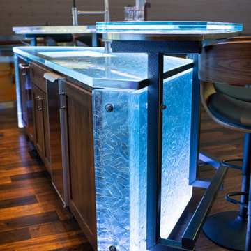 Glass private bar and glass stair treads inside a man cave in Michigan