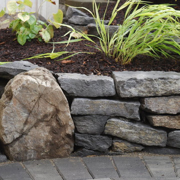 Dry stack stone masonry wall