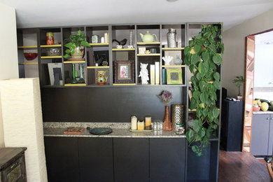 Example of a small eclectic home design design in San Diego
