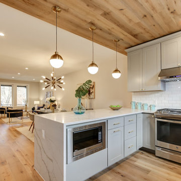 Kitchen Remodeled With White Countertops, Extra Cooking Space & Large Cabinets