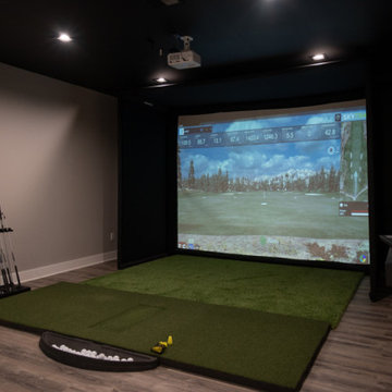 Finished Basement with Seated Bar, Wine Room and Golf Simulator in Rochester, MI