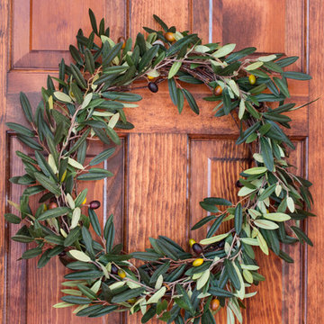 Nearly Natural Olive Wreath - Dark Brown Stained Door at Entryway