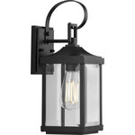 Progress Lighting - Gibbes Street Collection 1-Light Small Wall Lantern - Incorporate a flawless lighting experience that fills your home with an understated elegance and rustic charm with this wall lantern. This farmhouse-inspired masterpiece cradles clear beveled glass panes just right for offering a warm, welcoming glow to your friends and family. A traditional lantern frame with a beautiful black finish houses the light bases in this timeless design.