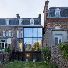 Architecture : Gagner en luminosité grâce à une extension en verre