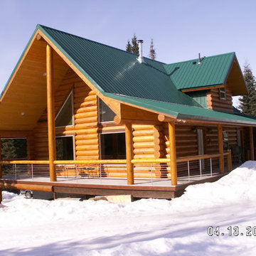 Kenai, AK Peeled Wood Posts and Top Rail with Steel Posts and Cable Infill