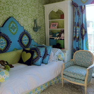 Eclectic kids' bedroom in Miami with carpet and multi-coloured walls for girls.