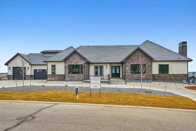 Inspiration for a transitional exterior home remodel in Denver
