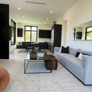 Open-Concept Living and Dining with Black Cabinetry - Studio City