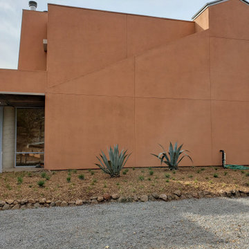 Fire Rebuild with Hamilton Statue and Native Plants