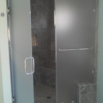 Frosted Frameless Glass Shower Door With Slate Gray Tile