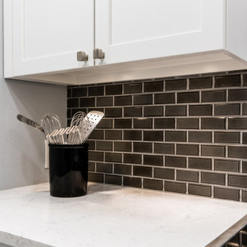 Japanese porcelain mosaic tiles Backslash in Upscale Luxury Townhome Kitchen
