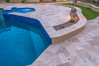 Example of a trendy home design design in Phoenix