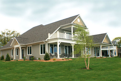 Inspiration for a mid-sized coastal exterior home remodel in Other