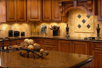 Example of a mid-sized classic l-shaped enclosed kitchen design in Cleveland with an island