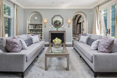 Living room - large transitional formal and enclosed carpeted living room idea in Chicago with gray walls, a standard fireplace, a stone fireplace and no tv
