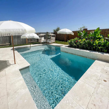 Geometric Pool with Raised Tropical Planters