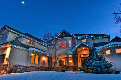 Large two-story mixed siding exterior home photo in Denver