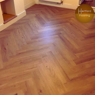 Wood inspired LVT...In a herringbone pattern...
