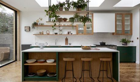 Kitchen Tour: Dark Green and Oak Bring the Outside In