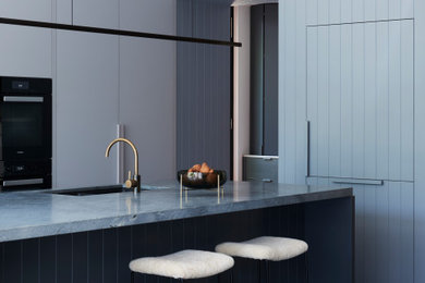 Design ideas for a mid-sized contemporary kitchen in Melbourne with marble benchtops.