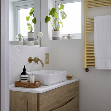 Contemporary bathroom with brass fittings