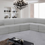 Meridian Furniture - Ollie Black Boucle Fabric L-Shaped Modular Sectional, Grey, 6-Piece: 3 Armless Chair, 3 Corner Chair - The Ollie Boucle Fabric Sectional is a truly stunning piece that boasts an elegant and attention-grabbing design. It is upholstered in a rich grey boucle fabric that feels soft and smooth to the touch, making it the perfect addition to any space that requires a touch of sophistication and style. The sectional's modular design ensures that it can easily fit into any room layout, while its plush cushioning provides optimum comfort for you and your guests. Whether you're entertaining guests or simply relaxing after a long day, the Ollie sectional is the perfect piece to help you unwind in style.