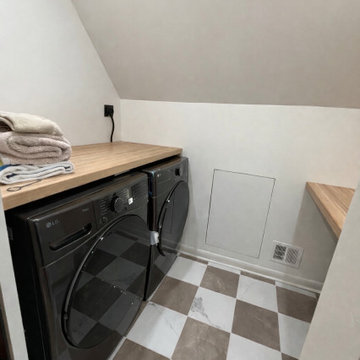 Closet Converted to Bathroom and Bathroom Converted to Laundry.