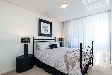 This is an example of a contemporary bedroom in Perth.