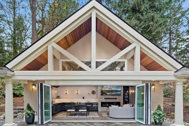 Inspiration for a large contemporary backyard brick patio remodel in Seattle with a bbq area and a gazebo