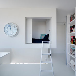 Modern home office and library in Other with white walls, a built-in desk and white floors.