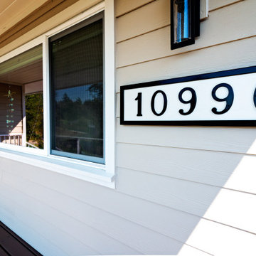 Modern Cottage Exterior with Hardie Plank Siding & Cedar Porch
