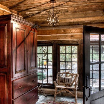 Weathered Antique Ceiling Paneling in a Rustic Log Cabin Entryway