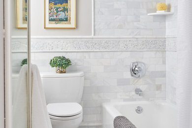 Inspiration for a timeless white tile bathroom remodel in Wilmington with a two-piece toilet and gray walls