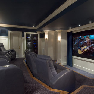Inspiration for a timeless blue floor home theater remodel in Toronto with blue walls