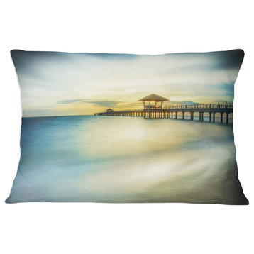 Blue Tinged Seashore with Distant Pier Pier Seascape Throw Pillow, 12"x20"