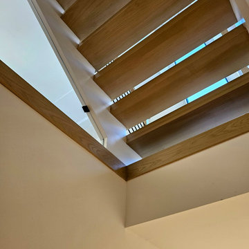 Project #111 | Open-Riser Staircase with Glass Panel Detail