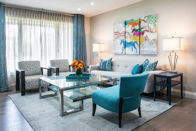 Inspiration for a mid-sized contemporary formal and open concept medium tone wood floor living room remodel in Toronto with gray walls and no fireplace