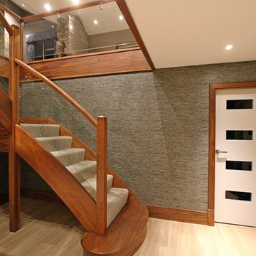 Curved Walnut Stairs & Feature Doors