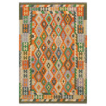 Bareens Designer Rugs - Tribal Turkish Kilim Nigel� Hand-Woven Wool Rug - 5'1'' x 6'5'' - Elevate the elegance of your home with this stunning hand-woven tribal Kilim wool rug. Meticulously crafted on a loom by the Nomad Turkman people using hand-spun wool and 100% natural vegetable dyes, these rugs are recognized for their repetitive geometric patterns, incorporating naturalistic floral and traditional designs. The contemporary fashion palette results in bold, sharp patterns that are incredibly versatile, as the pattern is the same on both sides. These reversible rugs feature a lighter shade on one side and brighter colors on the other, providing versatility according to preference. These unique rugs are made by knotting short strands of different colors onto the warps and securing them by tightly pressing the wefts. The designs are created by interweaving the various colored wefts and warps. Kilims are known for their exceptional durability and versatility, making them truly unique rugs.  Product Details    Rug Size: 5'1'' x 6'5''  Material: 100% Wool  Style: Kilim, Flat Weave, Dhurrie, Turkish, Southwestern, Rustic, Tribal  Colors: Rust, Blue  Weave Type: Hand-Woven, Handmade  Pile Height: Less than 0.25 inch