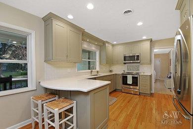 Example of a transitional kitchen design in Orlando