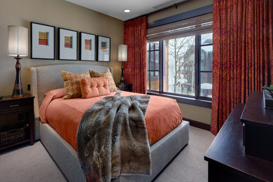Photo of a mid-sized contemporary guest bedroom in Salt Lake City with beige walls, carpet and no fireplace.