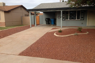 Example of a transitional exterior home design in Phoenix