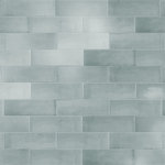 Merola Tile - Coco Glossy Blue Grass Porcelain Wall Tile - Offering a subway look, our Coco Glossy Blue Grass Porcelain Wall Tile features a smooth, glossy finish, providing decorative appeal that adapts to a variety of stylistic contexts. Containing 100 different print variations that are randomly distributed throughout each case, this gray rectangle tile offers a one-of-a-kind look. With its impervious, frost-resistant features, this tile is an ideal selection for both indoor and outdoor commercial and residential installations, including kitchens, bathrooms, backsplashes, showers, hallways and fireplace facades. This tile is a perfect choice on its own or paired with other products in the Coco Collection. Tile is the better choice for your space!