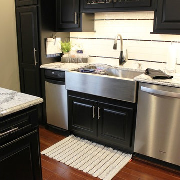 Small Island Kitchen with Black Painted Cabinetry in Taylor Ridge, IL