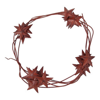 Texas Favorites & Country Treasures - Grapevine garland with lights and  rusty stars makes for a beautiful rustic look around the outside window.  <3