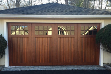 Design ideas for a large traditional detached two-car garage in Boston.