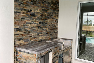 Inspiration for a rustic patio remodel in Miami